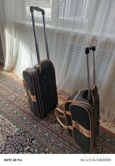 Дорожные сумки с колёсиками и ручкой