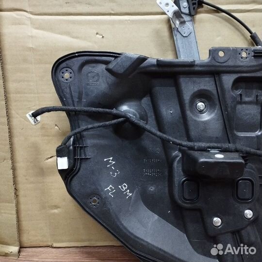 Стеклоподъемник электрический передний левый Mazda