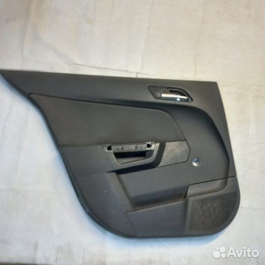 Обшивка двери задняя левая Opel Astra H
