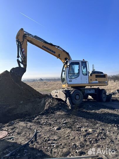 Колёсный экскаватор услуги экскаватора