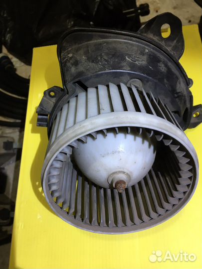 Моторчик отопителя Опель Корса