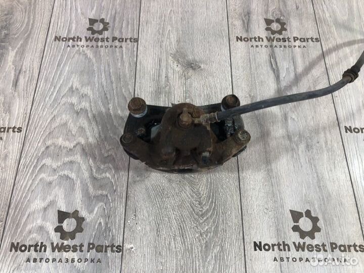 Суппорт передний левый Nissan Juke (Yf15)