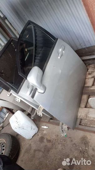 Дверь передняя левая Suzuki liana 2001 2007