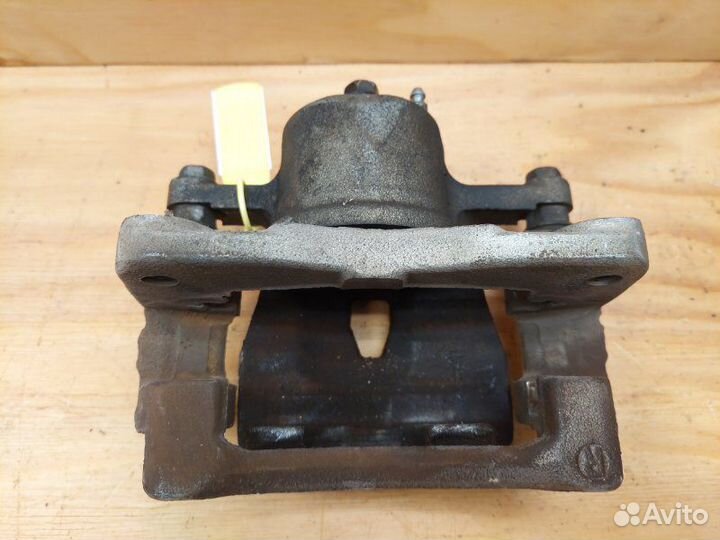 Суппорт передний правый Toyota Vitz KSP90 1krfe