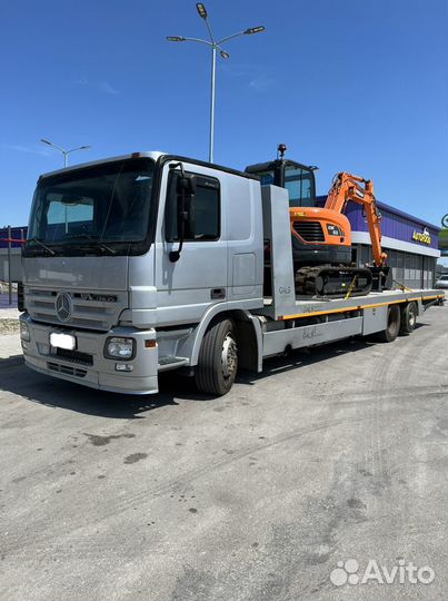 Грузовой эвакуатор, трал, перевозки спецтехники