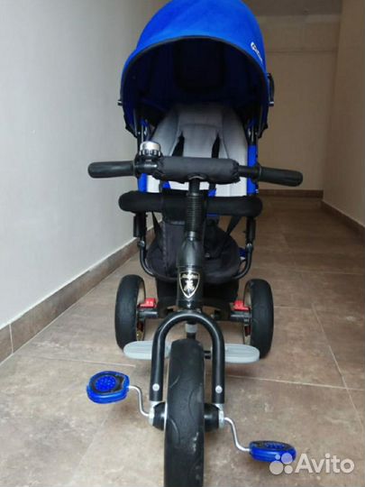 Трехколесный велосипед с ручкой