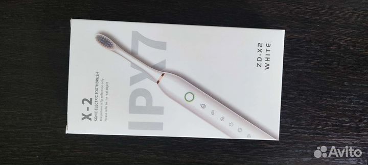 Электрическая зубная щётка