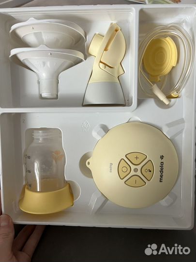 Молокоотсос medela swing flex