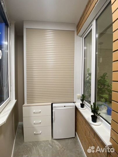 Шкаф с рольставнями на балкон на заказ