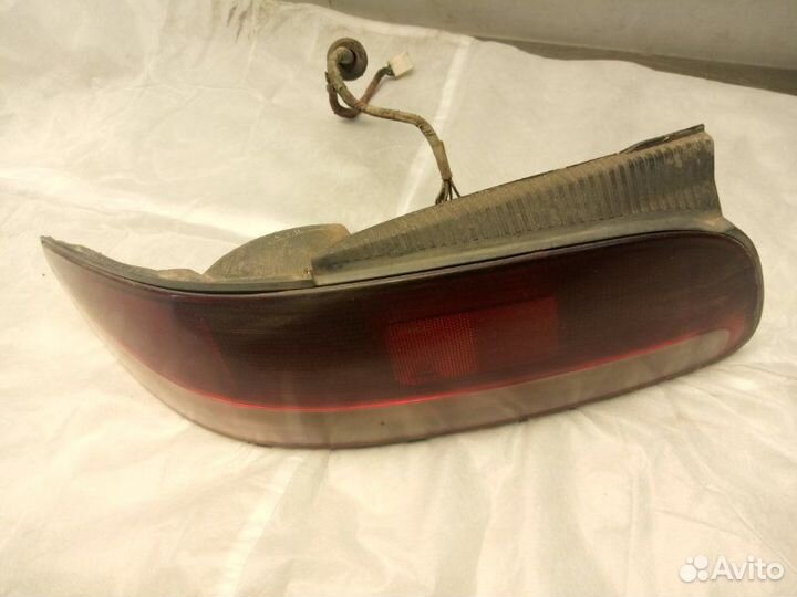 Фонарь задний левый Toyota Curren ST206 3SFE