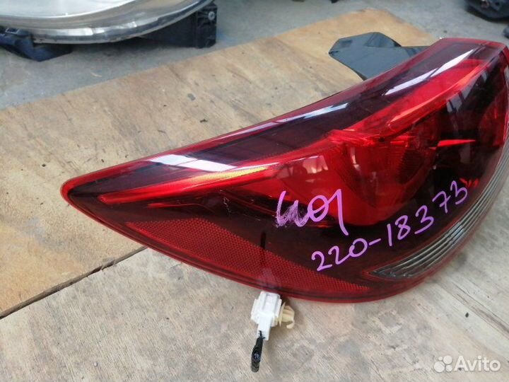 Стоп-сигнал задний левый Mazda Demio DJ