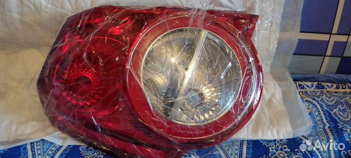 Новая левая задняя фара Chevrolet Aveo 2011