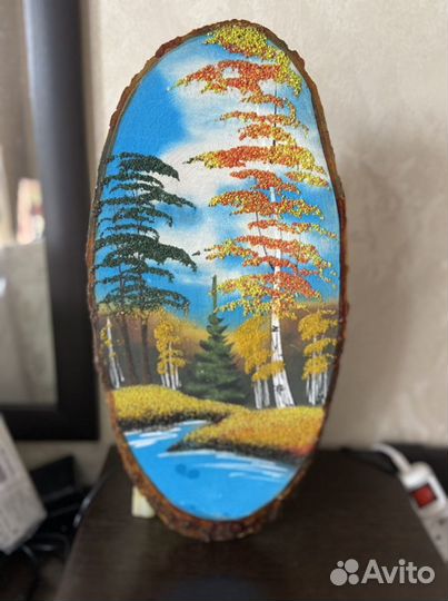 Картина на срезе дерева