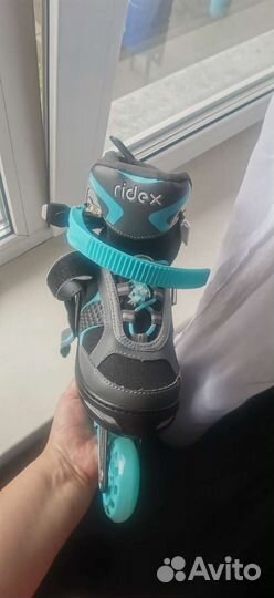 Роликовые коньки