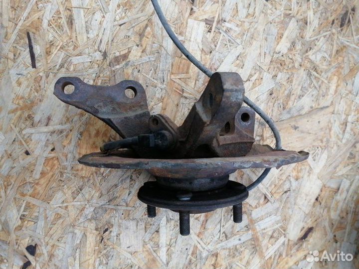 Кулак поворотный передний левый Mitsubishi Lancer