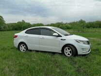 Kia Rio 1.4 AT, 2014, 200 000 км, с пробегом, цена 689 999 руб.