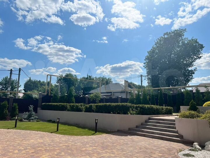 Коттедж 359,5 м² на участке 20 сот.