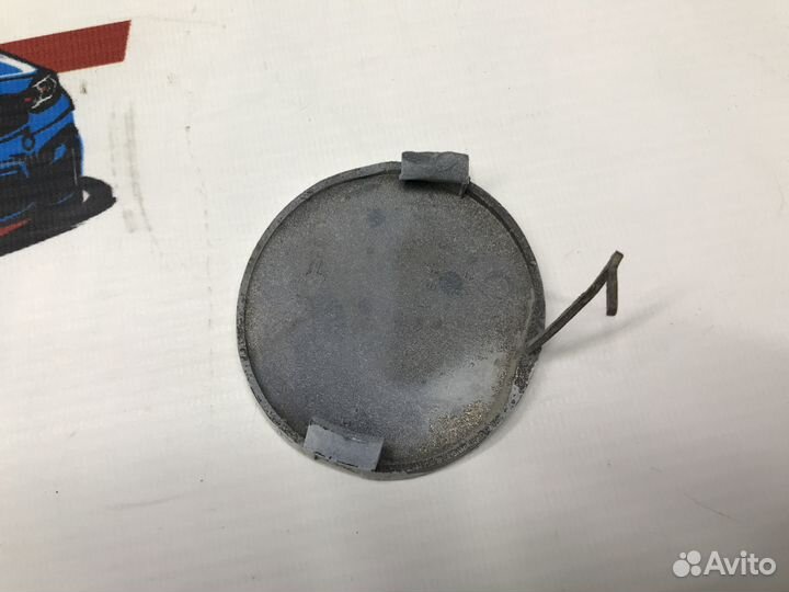 Заглушка буксировочного крюка передняя Toyota Vitz