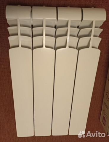 Новый биметаллический радиатор 4 секции h 560 мм