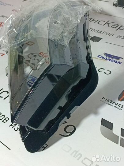 Стекло фары переднее левое Geely Emgrand