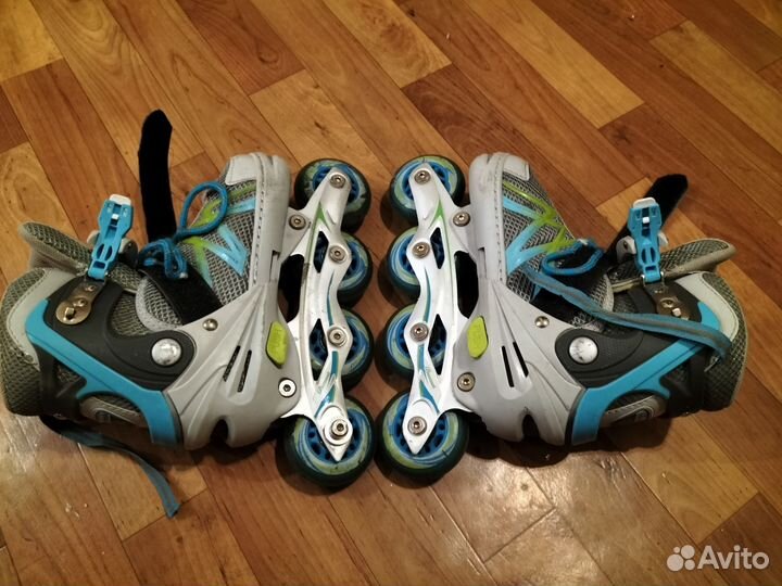 Роликовые коньки