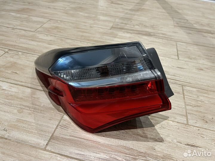 Фонарь задний Toyota Corolla 180 левый