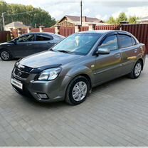 Kia Rio 1.4 AT, 2010, 158 300 км, с пробегом, цена 670 000 руб.