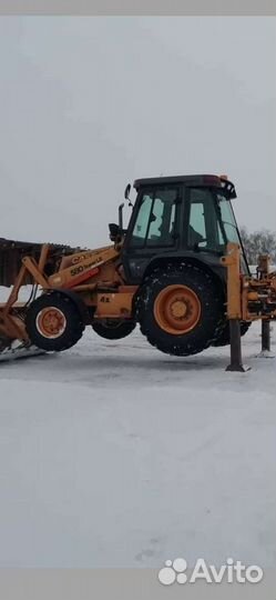 Экскаватор погрузчик Гидромолот