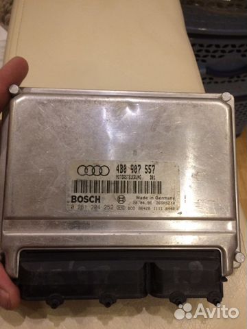 Блок управления двигателем 1.8 AJP 4B0907557 А6