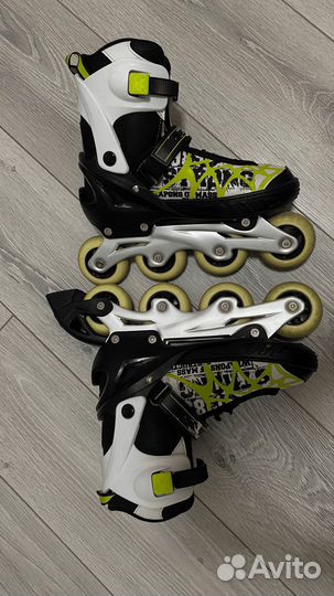 Роликовые коньки