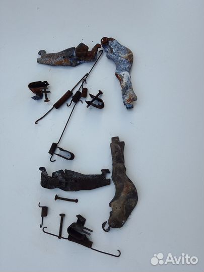 Механизм разведения колодок Nissan