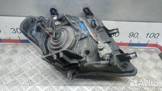 Фара левая nissan navara D40 (9NK12MR01)