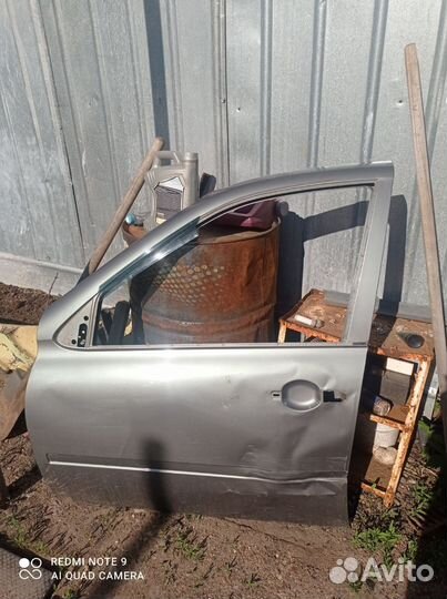 Дверь передняя левая калина 1