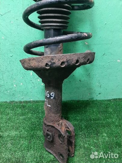 Стойка амортизатора передняя левая Subaru Foreste