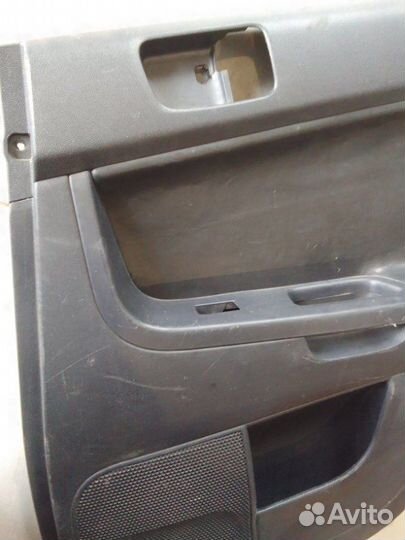 Обшивка двери задняя правая Mitsubishi Lancer 10