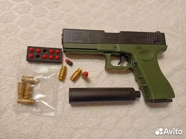 Пистолет игрушечный с вылетом гильз