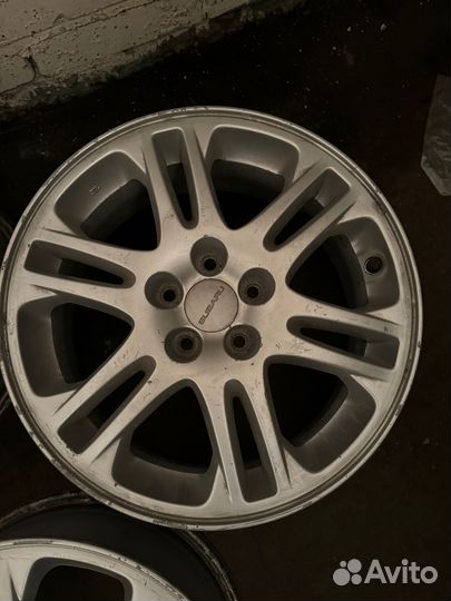 Продам оригинальные литые диски Subaru R16