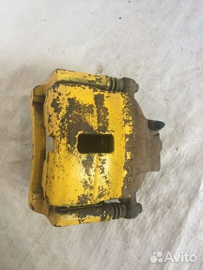 Суппорт тормозной передний правый Примера 11