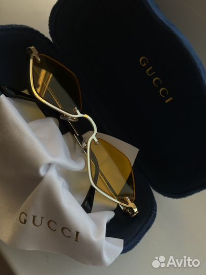 Солнцезащитные очки Gucci