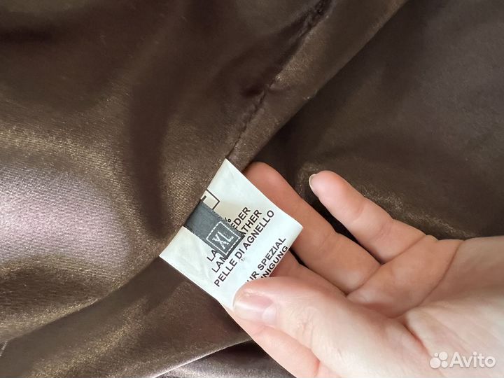 Меховая жилетка