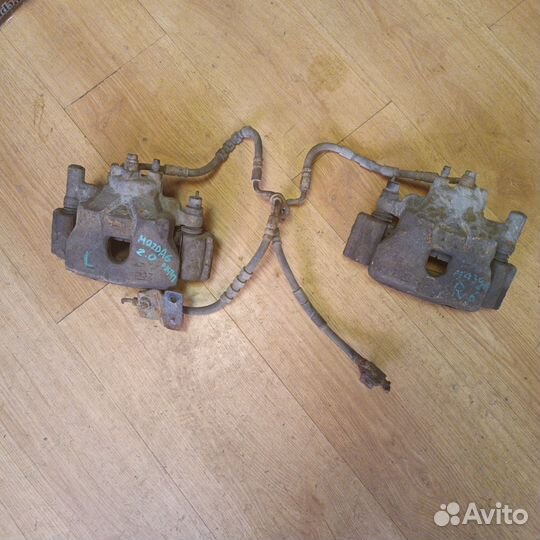 Передние суппорта mazda 6gg