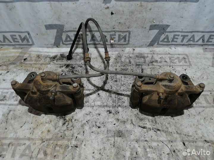 Суппорт передний левый Nissan Qashqai J10