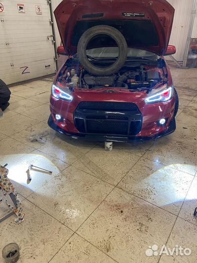 Бампер передний лансер 10