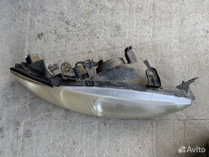 Фары передние Mitsubishi Colt CJ