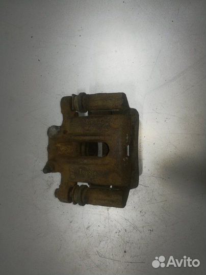 Суппорт задний левый Toyota Corolla 120