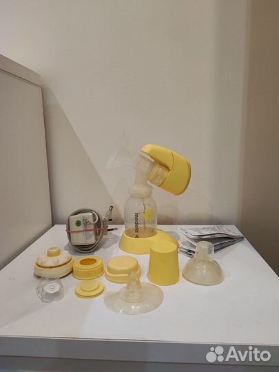 Молокоотсос medela электрический (накладки в подар