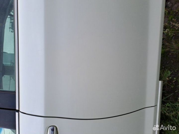 Дверь боковая задняя левая Toyota Corolla Axio