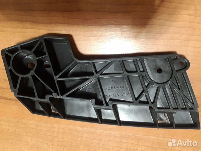 Кронштейн переднего бампера левый Nissan Tiida