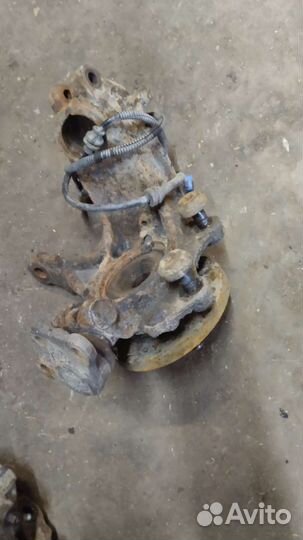 Кулак поворотный передний левый Peugeot 207