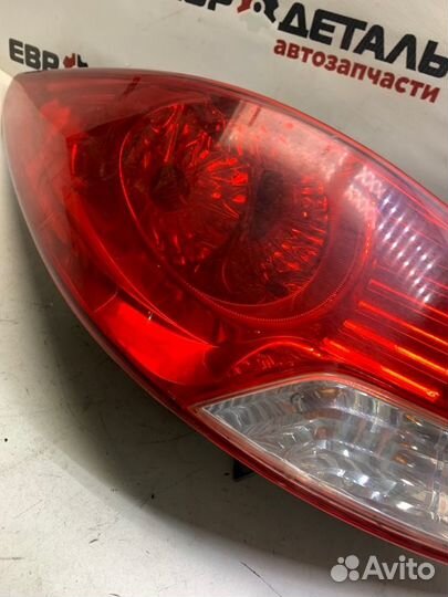 Фонарь левый Hyundai Solaris седан 1.4 G4FA 2013